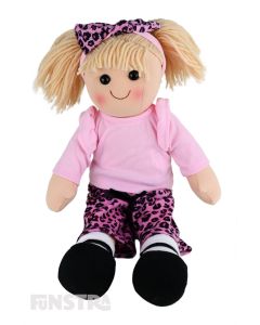 Natalie is a groovy doll with a soft cloth body and blonde hair tied back in pigtails and wears a pink top and pink leopard skin printed pants and a matching headband.