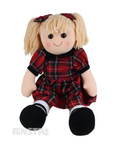 Ruby is an beautiful doll with a soft cloth body and blonde hair tied in pigtails with bows and wears a matching red tartan dress with black trim.