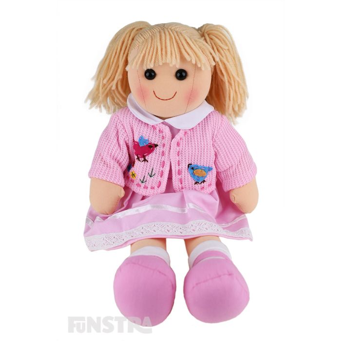 Daisy is a lovely doll with a soft cloth body and blonde hair tied in pigtails and wears a beautiful pink dress  and an embroidered jacket featuring little birds.