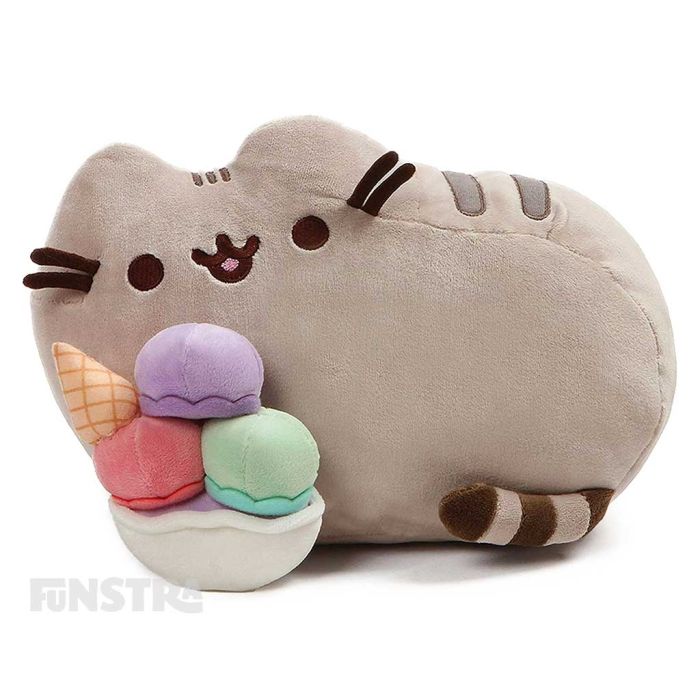 Pusheen is snacking on a huge, colorful ice cream sundae complete with an ice cream cone. The snack-loving cat loves to go on adventures with friends like Sloth, Stormy, Pip and Cheek in her popular webcomic with over 10 million social media fans.