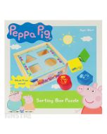 Learn colors and shapes with the Peppa Pig sorting box featuring colored blocks.