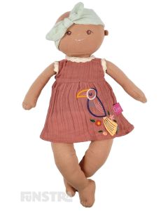 Adorable organic baby doll, Aria, wears a beautiful bird dress and bow headband with a soft cloth fabric body and weighted bottom.
