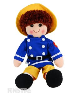 Ted is a firefighter doll with a soft cloth body and red-brown hair and wears yellow trousers, blue jacket and a yellow hat.