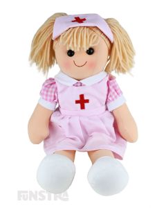 Thelma is an sweet and caring doll with a soft cloth body and blonde hair in pigtails and wears a pink nurse's uniform and nurse's hat.