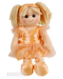 Amber is an elegance ballet dancer doll with a soft cloth body and blonde hair in pigtails with a peach headband and wears a matching peach classical tutu with ballet slippers.
