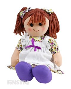 Elizabeth is a classic doll with a soft cloth body 
 with auburn hair tied with bows in pigtails and wears a floral print dress, topped with a white pinafore apron.