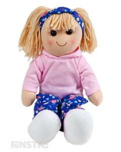 Fifi is a sporty doll with a soft cloth body with blonde hair tied in pigtails secured with a headband and wears floral print pants with a pink hoodie.