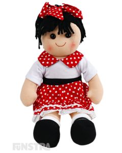 Layla is playful doll with a soft cloth body with a Minnie Mouse-inspired look with black hair tied in a ponytail and wears a red skirt with white polka dots and a white top with a matching collar.