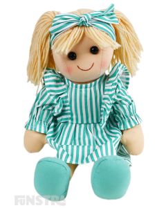 Sylvie is an elegant doll with a soft cloth body and blonde hair in pigtails with a green and white striped headband and wears a matching ruffled dress.
